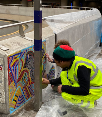 People working on the mosaic